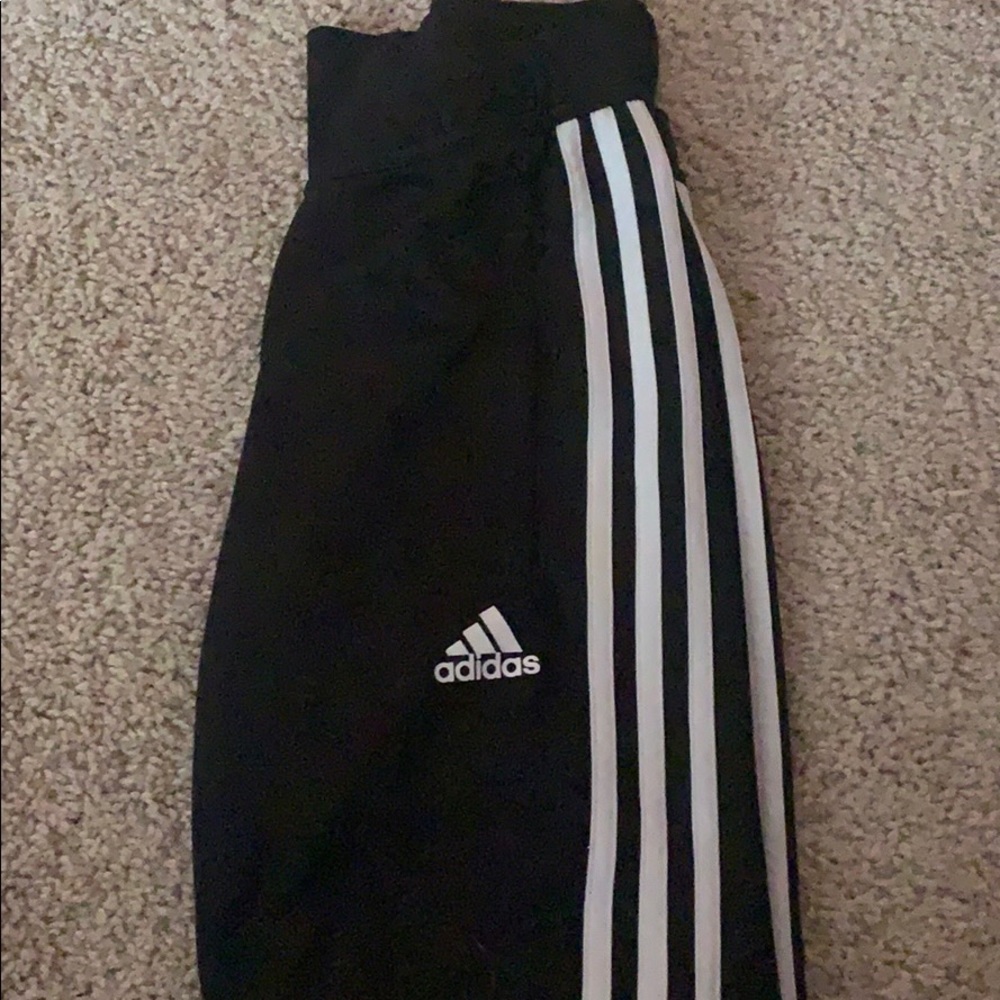 Adidas half stripe black soccer pants. Size XS